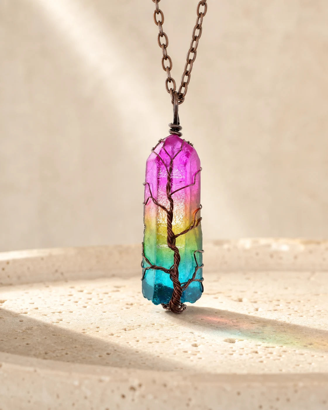 Prism Tree Necklace on a warm neutral studio surface